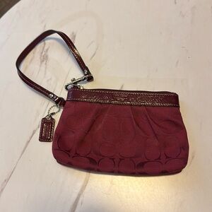 Coach burgundy wristlet